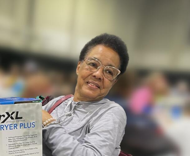 A smiling elderly black woman